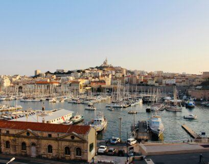 white boats at a dock