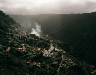aerial view of city near mountain during daytime