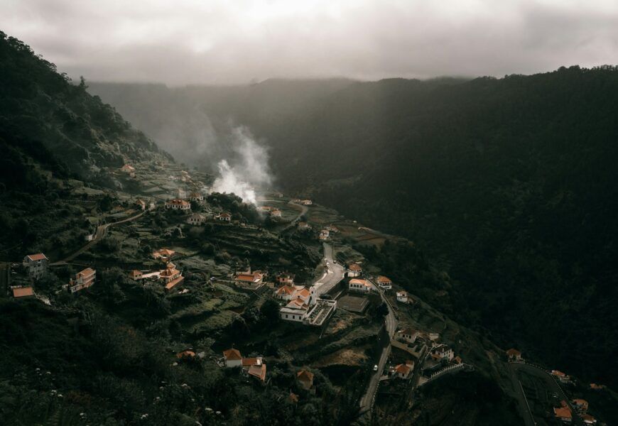 aerial view of city near mountain during daytime